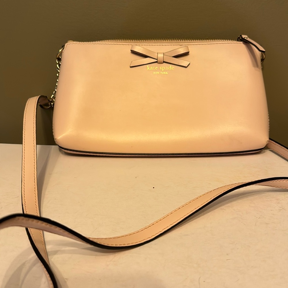 Kate Spade leather crossbody pink with bow